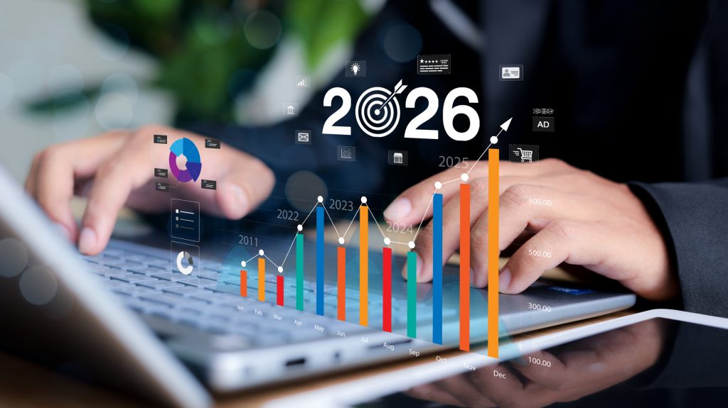 Businessman plan strategy marketing and finance to goal in 2026 planning business growth with technology AI and environmental care to New Year resolutions business.